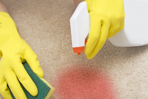 Professional oven cleaner in Edgware restoring a dirty oven