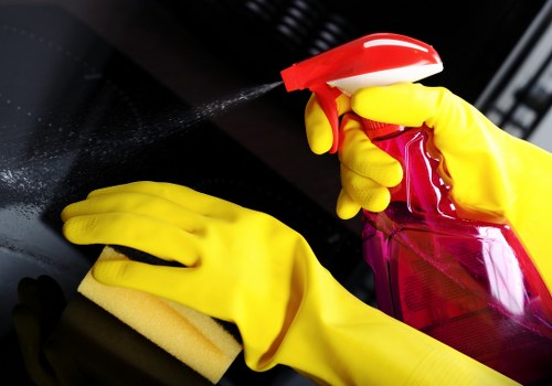Cleaner in Edgware performing deep cleaning in a bathroom